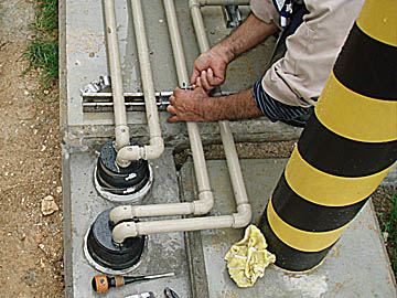 Installing fuel pipes.